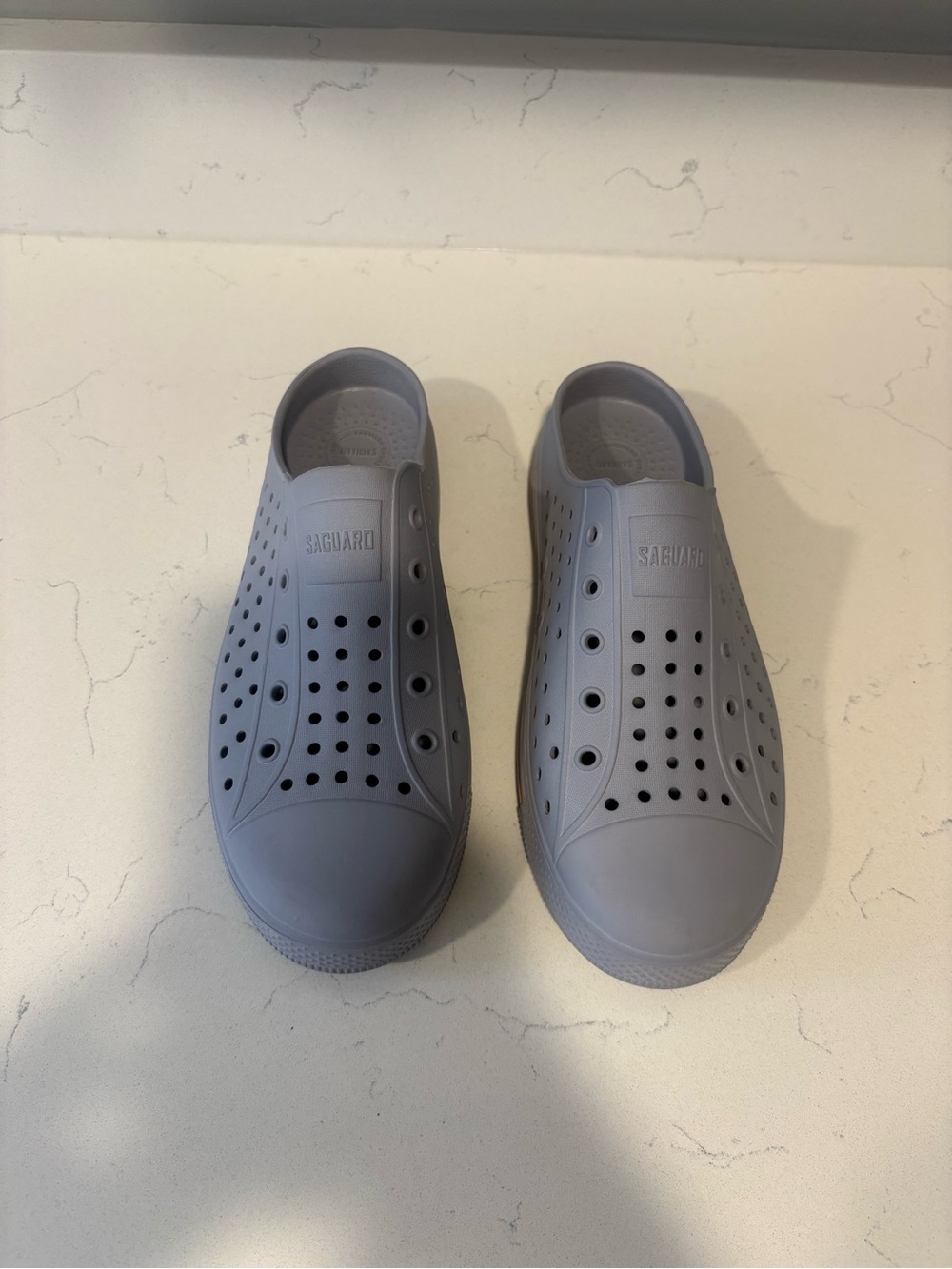 Woman’s lavender Saguaro rubber slides with sneaker front